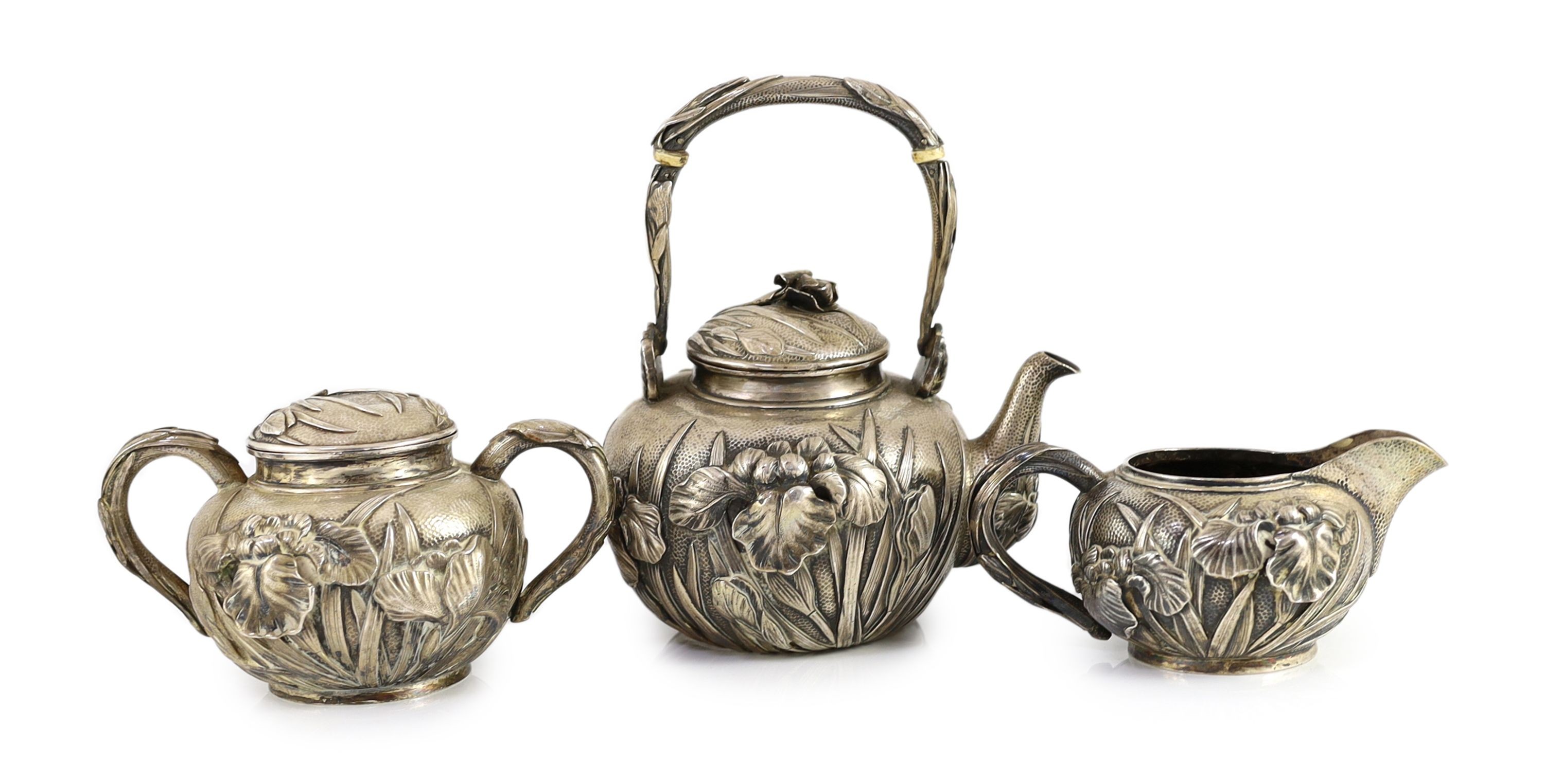 A Japanese Meiji period three piece silver tea set